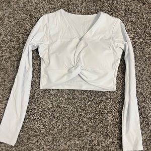 White twist long sleeve crop top. Brand new.